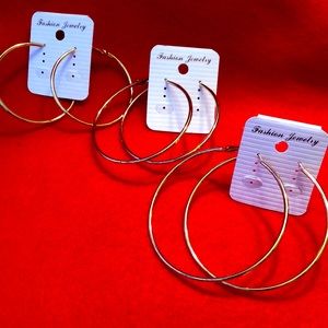 Set of 3  Gold tone hoop earrings